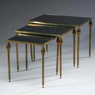 Three French Maison Jansen style brass nesting tables with fluted legs and mirrored glass tops, 1960s