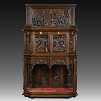 A French richly carved oak Neo-Renaissance credence with portrait miniatures, 19th C.