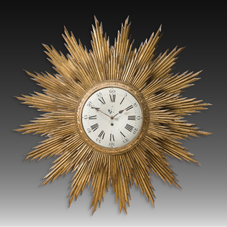 An imposing German carved and gilt wooden sundial with an 'Actien-Gesellschaft Uhrenfabrik Lenzkirch' (AGUL) mechanism, ca. 1900