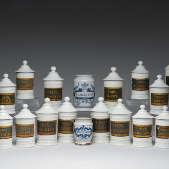 Two Dutch Delft blue and white and eighteen gilt and polychrome decorated porcelain pharmacy jars, 18th/19th C.