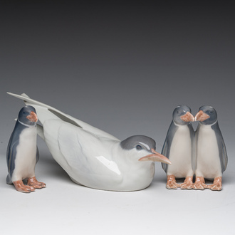 Three Danish Royal Copenhagen polychrome decorated porcelain models of an Arctic tern and penguins, 20th C.