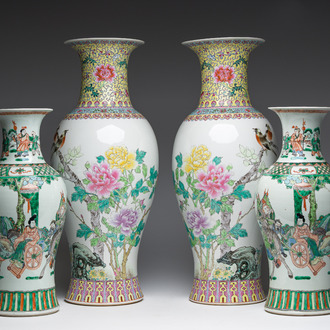 Two pairs of Chinese famille rose and famille verte vases with birds among blossoming branches and animated scenes, 20th C.