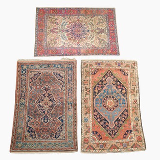 Three oriental rugs with floral design, Tabriz, Sarouk and Hamadan, wool on cotton, 20th C.