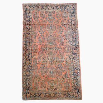 A Persian Sarouk rug with floral design, wool on cotton, first half 20th C.