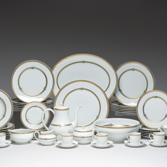 A French 50-piece polychrome and gilt porcelain 'Ruban or' service, Christofle, 20th C.