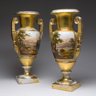 A pair of fine gilt and polychrome Paris porcelain 'animated landscapes' Empire vases, first half 19th C.