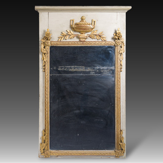 A French Louis XVI patinated and gilt wooden trumeau mirror, second half 18th C.