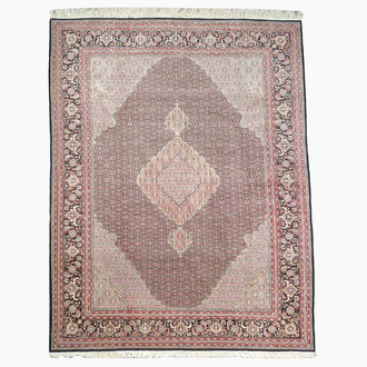 A Persian Bidjar rug with floral design, wool, cotton and silk, 20th C.