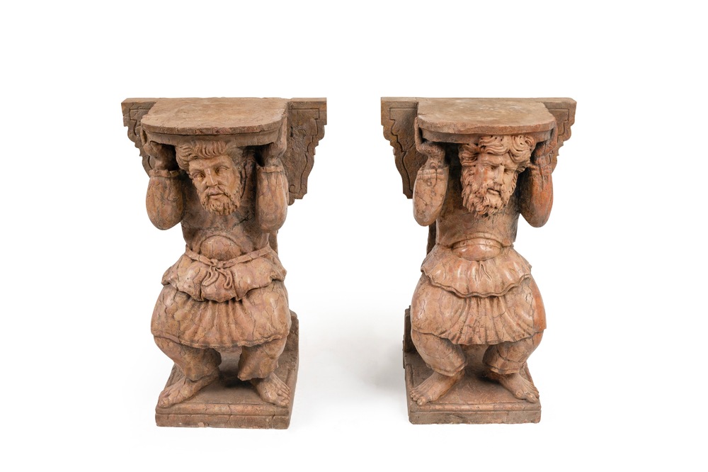 A pair of red marble atlas or atlant supports, Italy, 20th C.