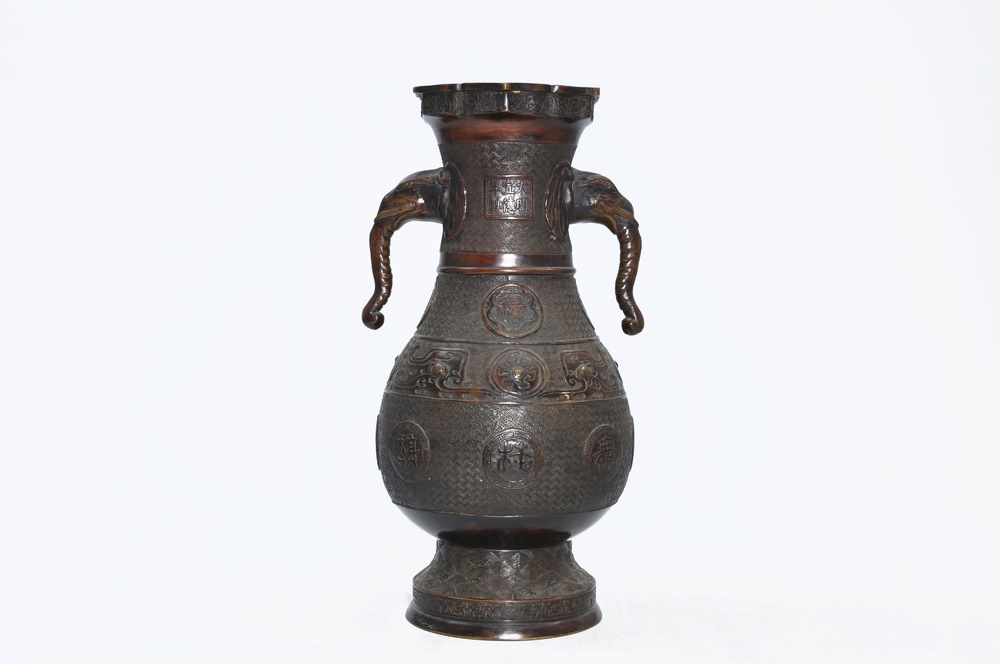 A tall Japanese bronze vase with elephant head handles for the Chinese market, Xuande mark, Meiji, 19th C.