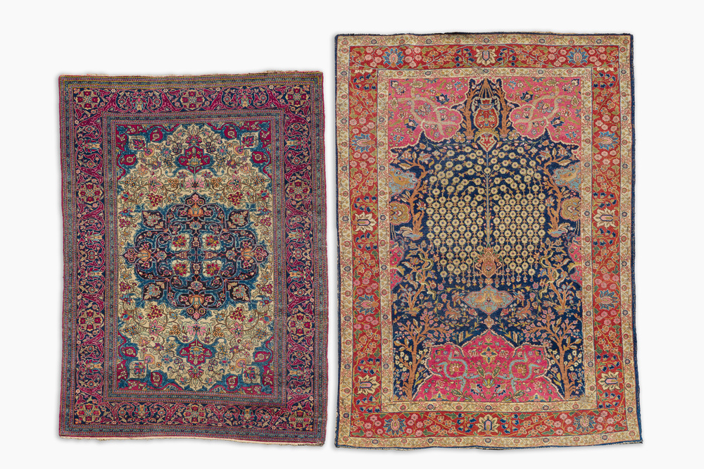 Deux tapis orientals de type Tabriz et Isphahan &agrave; d&eacute;cor floral, laine sur cotton, premi&egrave;re moiti&eacute; du 20&egrave;me si&egrave;cle