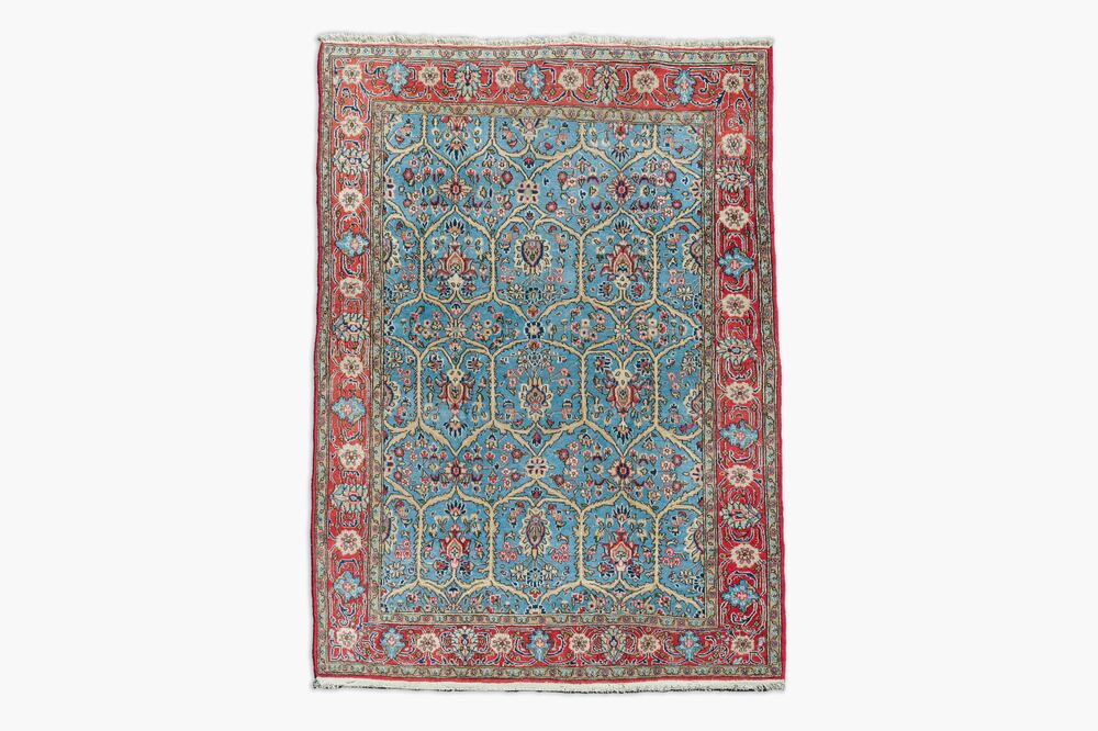 A Persian Qom (Qum/Ghom) Kork rug with floral design, wool on cotton, 20th C.
