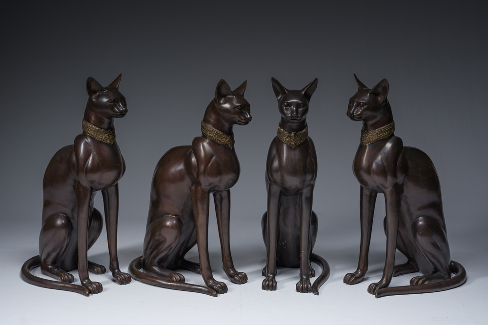 A. Tiot (20&egrave;me/21&egrave;me si&egrave;cle): Quatre statues de Bastet, bronze &agrave; patine brune