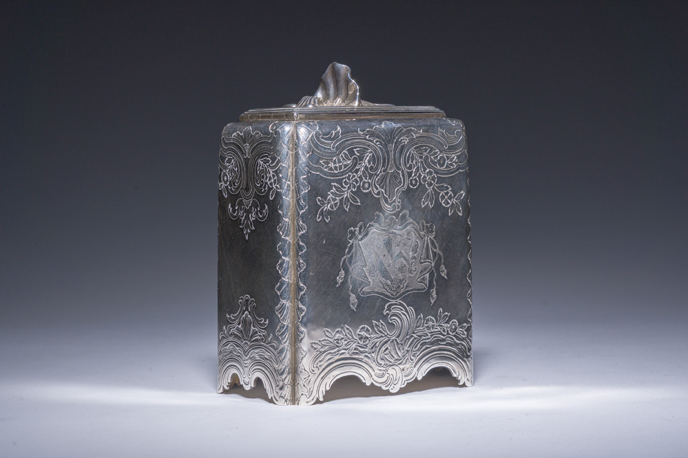 A rare English George II tea caddy with richly engraved floral design and coats of arms, London, maker's mark Paul de Lamerie, dated 1745