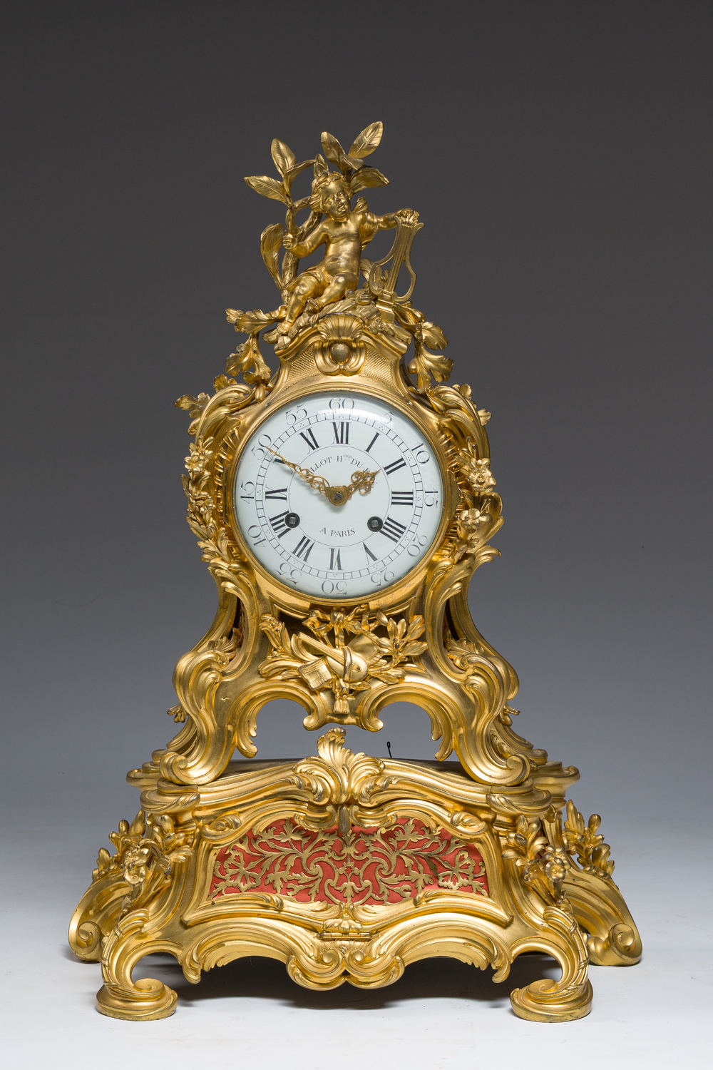 A French Louis XV gilt bronze quarter striking musical clock signed Millot, the bronze attributed to Robert Osmond, Paris, 3rd quarter 18th C.