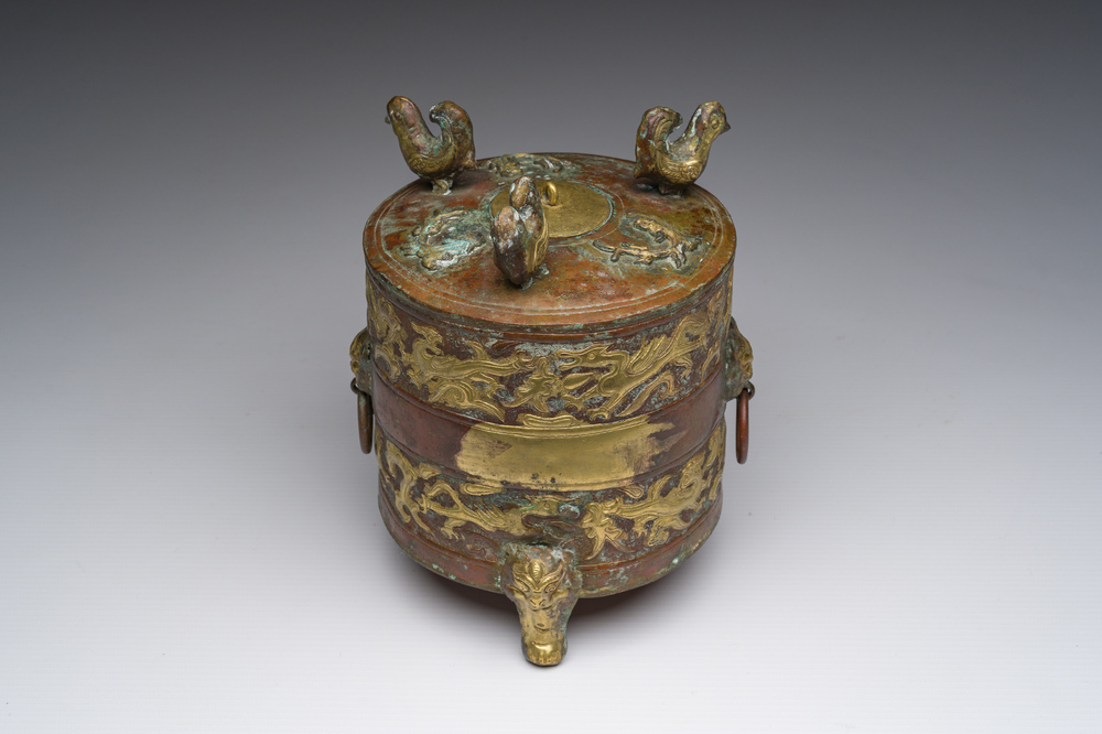 A Chinese parcel-gilt copper tripod 'zun' archaic vessel, probably 17th/18th C.