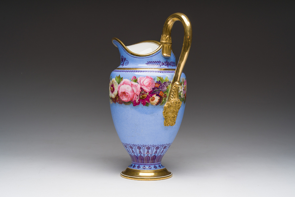 A Louis Philippe S&egrave;vres porcelain ewer with floral design on a blue ground, blue star mark, dated 1832