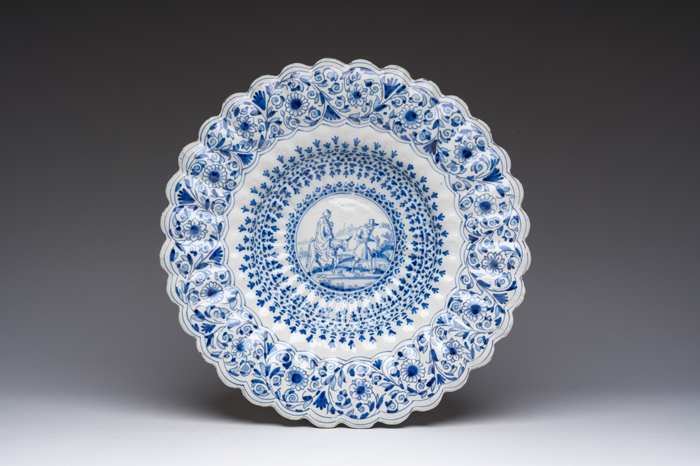 A blue and white Haarlem faience dish with 'The flight into Egypt', late 17th C.