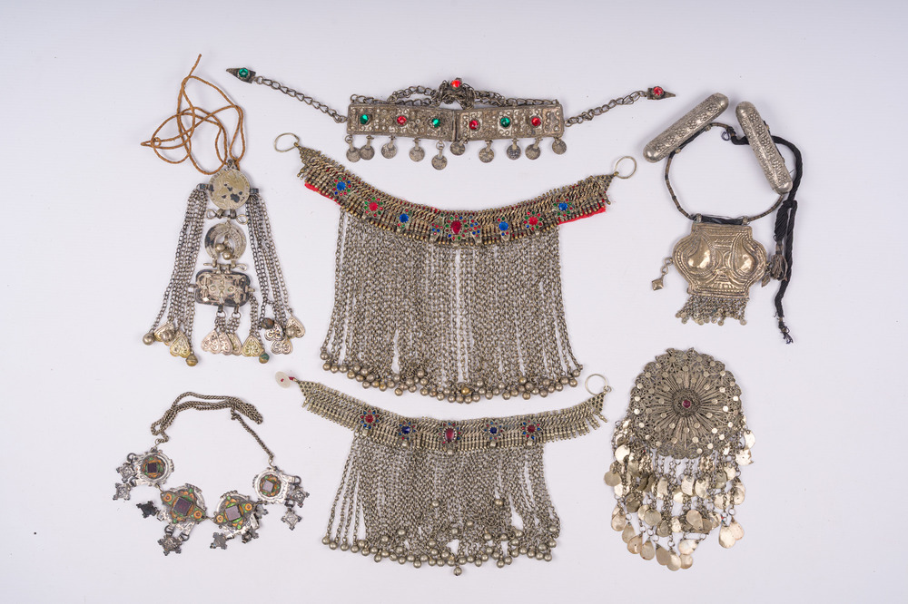 A collection of ethnographic silver, copper, glass and enamel jewelry, 19th/20th C.
