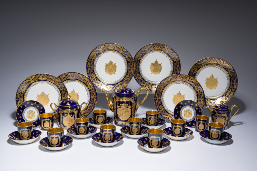 A 27-piece porcelain coffee service with the arms of the Second French Empire under Napoleon III, S&egrave;vres mark, France, 19th C.