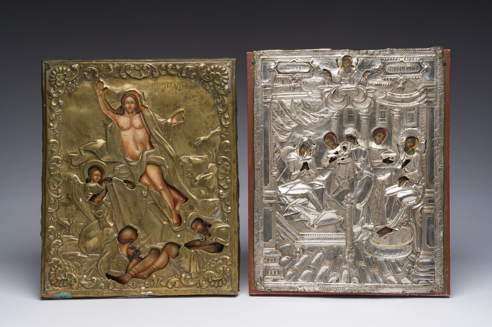 Two Russian orthodox icons with (silver-plated) brass oklad or riza, 'The Resurrection of Christ' and 'The Nativity of the Mother of God', 19th C.