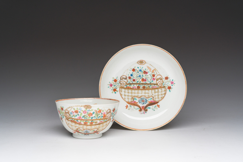 A Chinese famille rose 'flower basket' cup and saucer, Qianlong