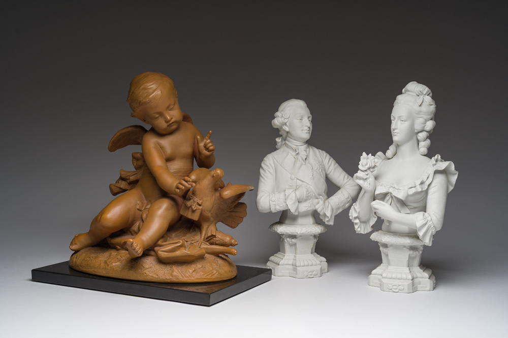 A pair of biscuit busts of Louis XVI and Marie-Antoinette and a patinated 'Cupid' group after Pigalle, 19th/20th C.