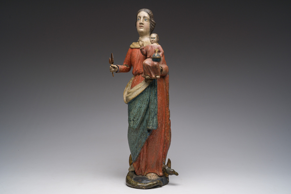 A Flemish polychromed wooden sculpture of The Madonna with Child, 18th C.