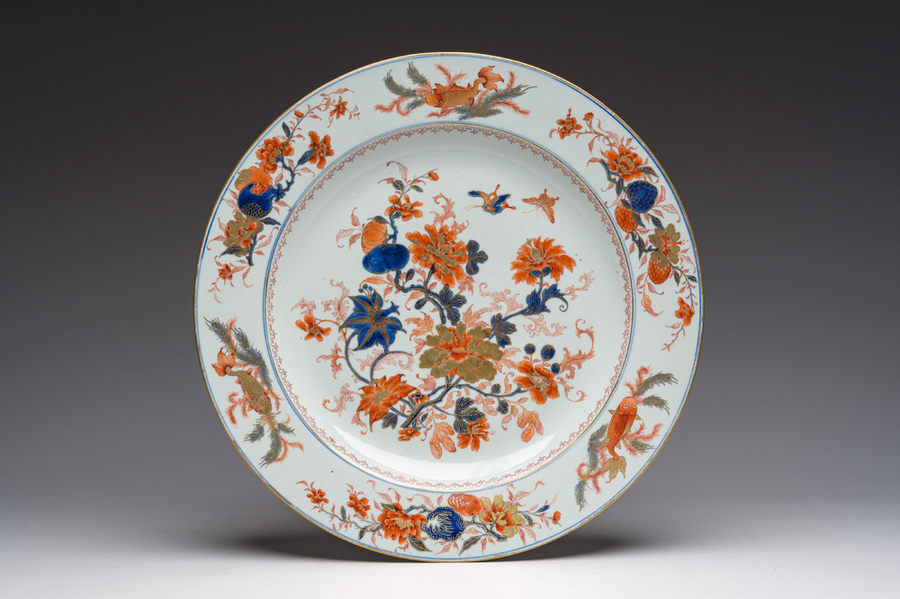 A Chinese Imari style dish with flowers, butterflies and carps, Kangxi