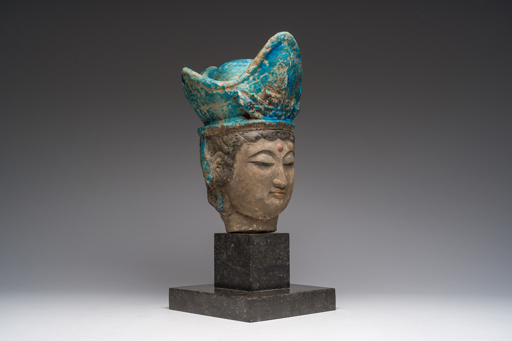 A large Chinese partly turquoise-glazed pottery head of Guanyin in Ming style, probably 19th C.