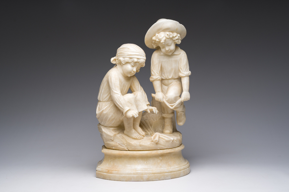 Italian school, attributed to Adolfo Cipriani (1857-1941): Two children warming themselves by the fire, alabaster, 20th C.