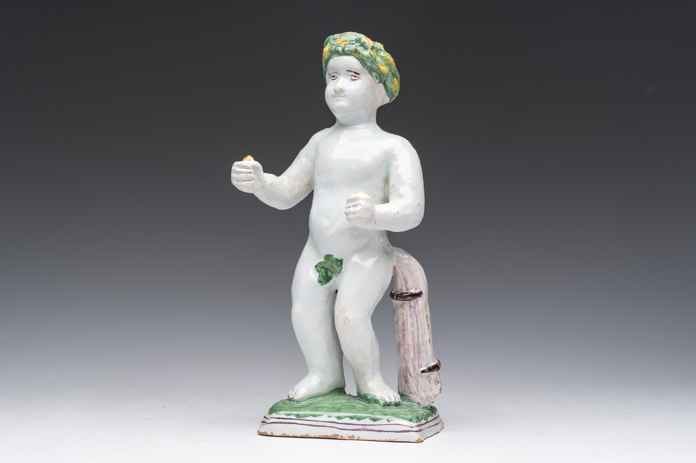 A polychrome Brussels faience allegorical sculpture depicting one of the four seasons, 19th C.