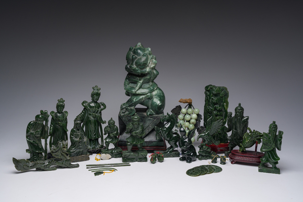 Sixteen Chinese green jade and hardstone sculptures, 20th C.