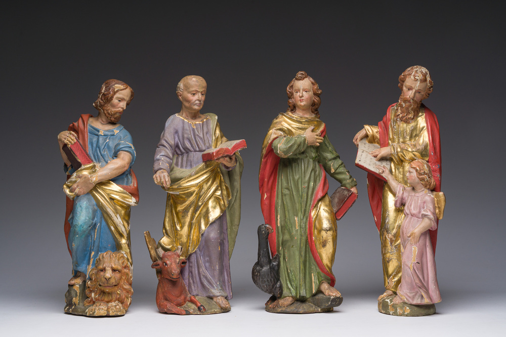 Four polychrome decorated wooden 'evangelist' sculptures, 19th C.