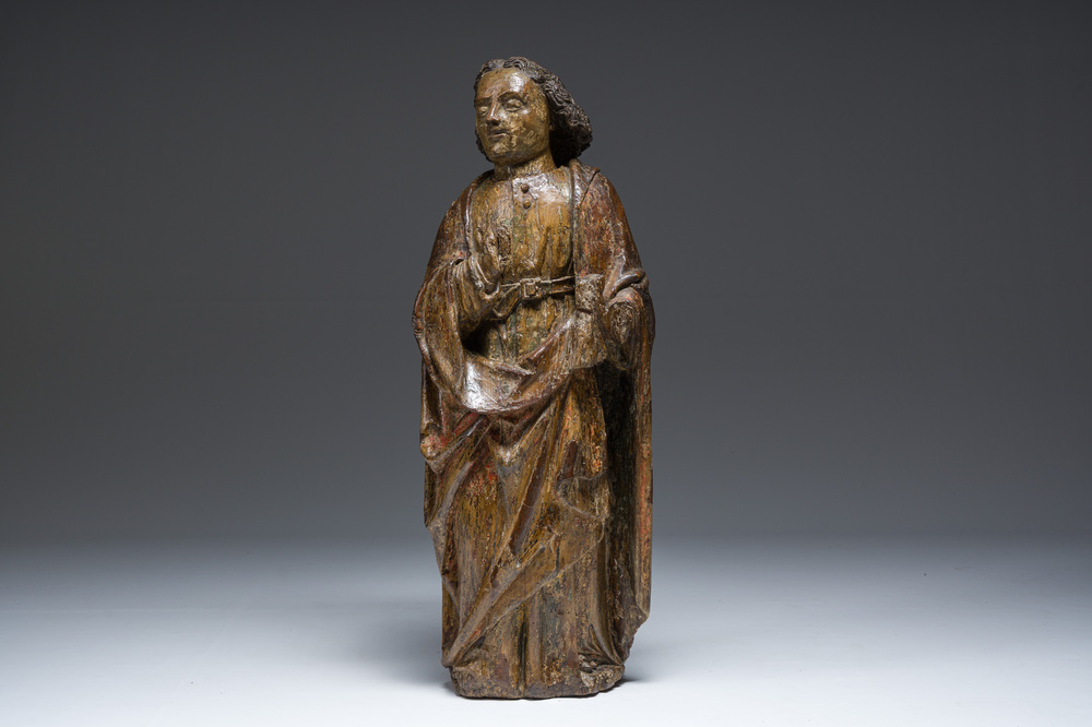 A large Flemish polychromed wooden 'Saint John' sculpture, 17th C.