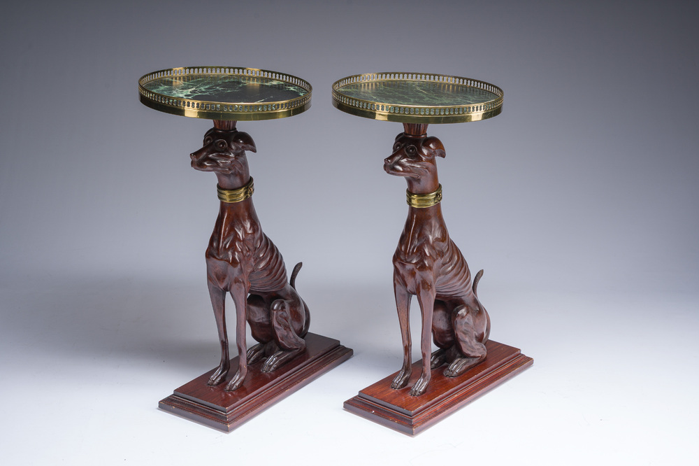A pair of Italian faux marble-topped carved wooden whippet side table, early 20th C.