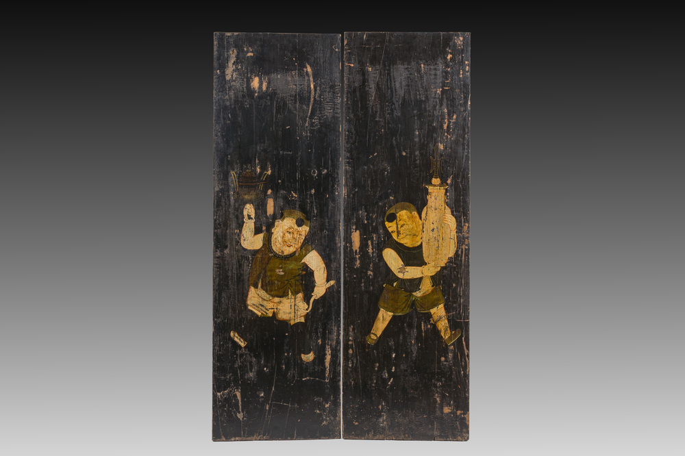 Two black-lacquered and polychromed wooden doors with boys holding a vase and a censer, Tibet, 19th C.