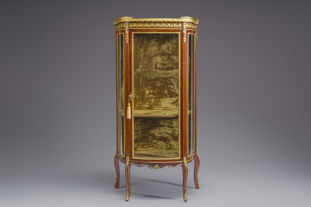 A French Louis XV style display cabinet with gilt bronze mounts, ca. 1900