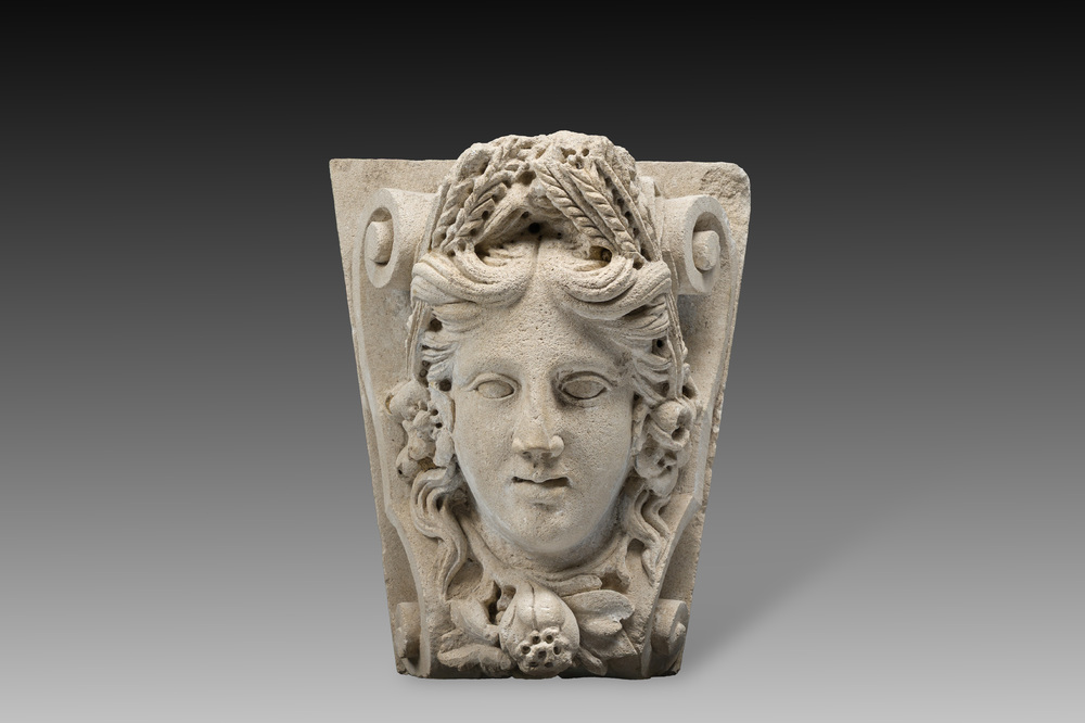 A large French architectural carved stone fragment with the head of Ceres, 19th C.