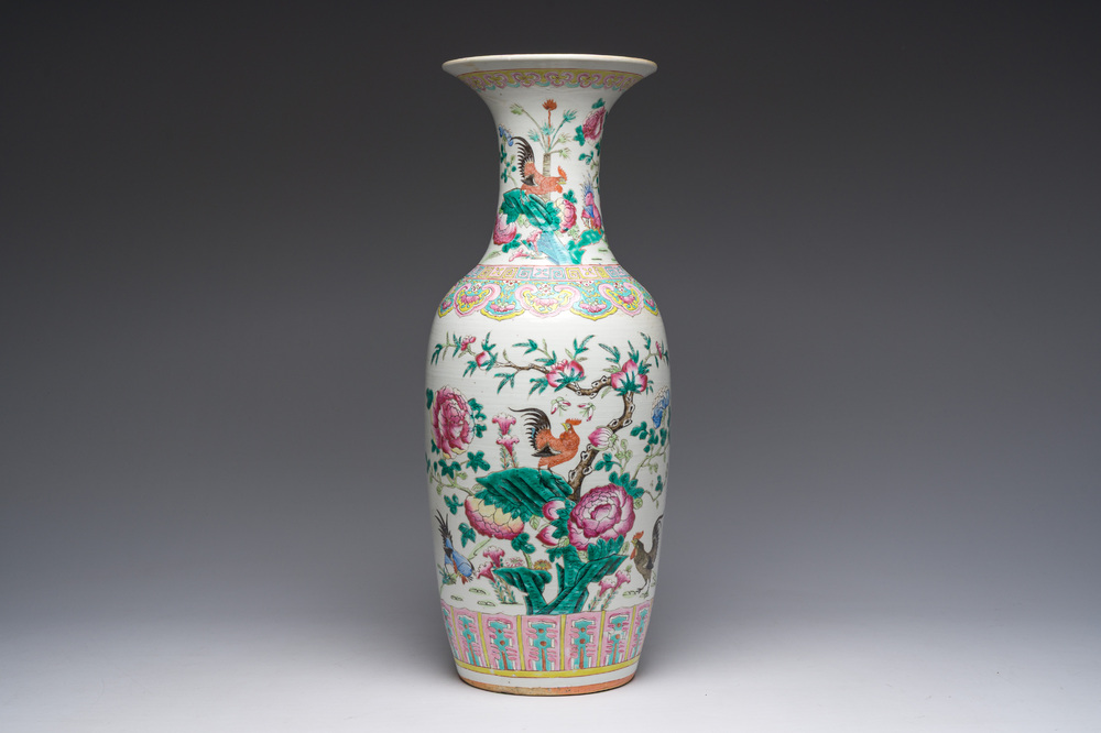 A Chinese famille rose vase with roosters among blossoming branches, 19th C.