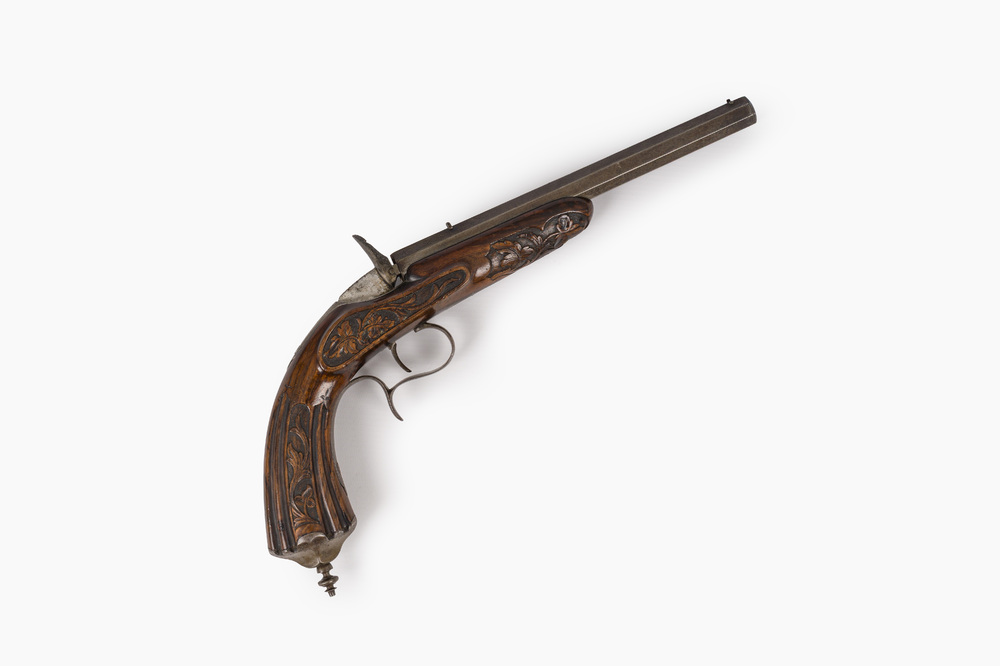 A Li&egrave;ge Flobert salon pistol with sculpted floral design, 19th C.