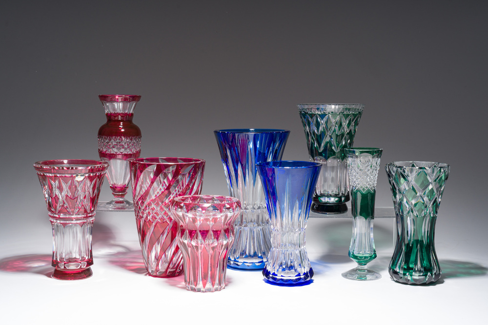 Nine partly coloured overlay cut crystal vases, Val Saint Lambert, Belgium, 20th C.