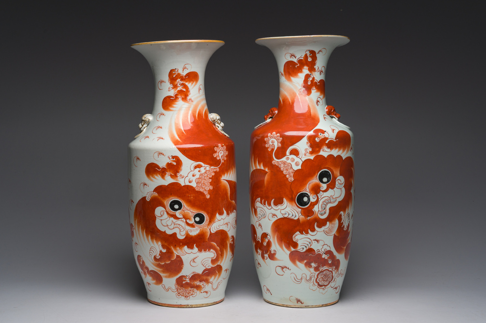 Two Chinese iron-red 'Buddhist lions' vases, 19th/20th C.