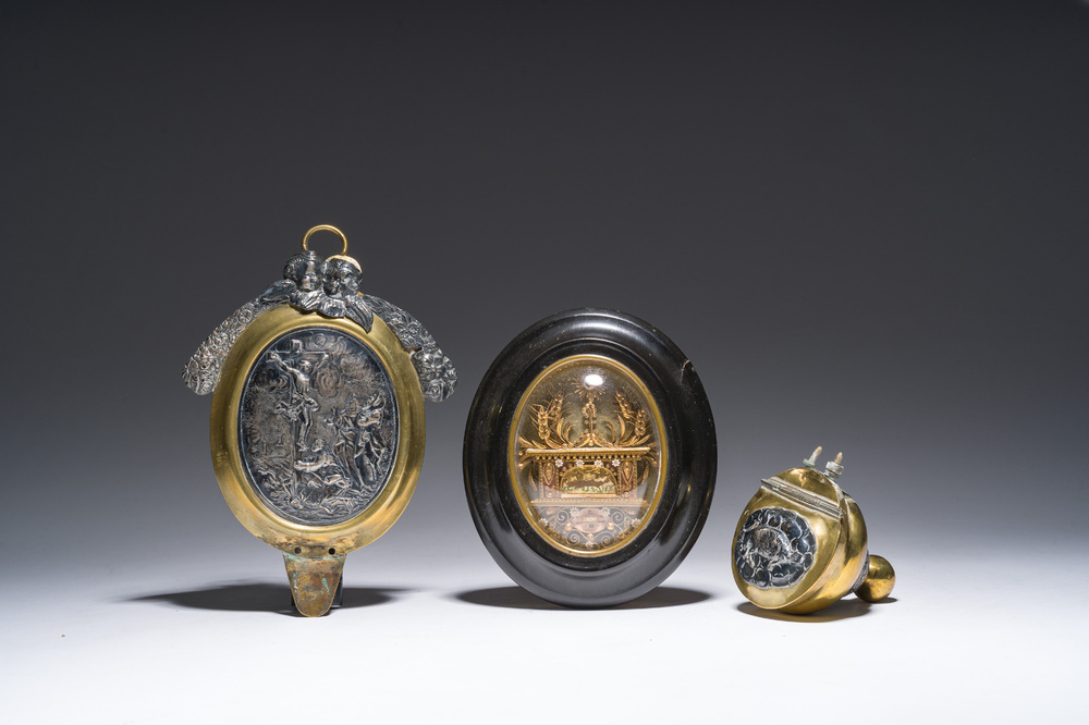 A Flemish silver 'Golgotha' ex-voto, a brass and silver 'Lamb of God' holy water font and a relic of Marg.-Marie Alacoque with filigree, 18th/19th C.