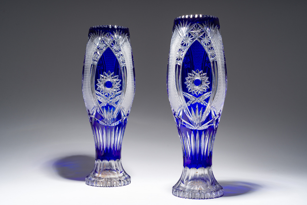 A pair of vases in partly blue coloured Bohemian crystal, 20th C.