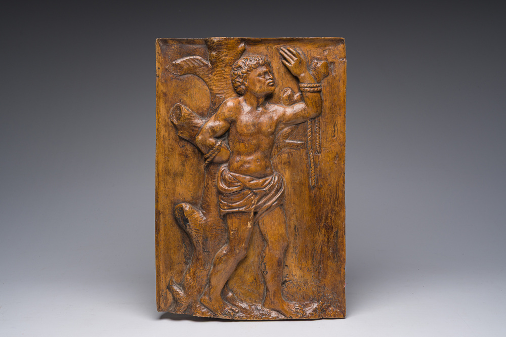 A carved wooden relief with Saint Sebastian, probably Southern Europe, 17th C.