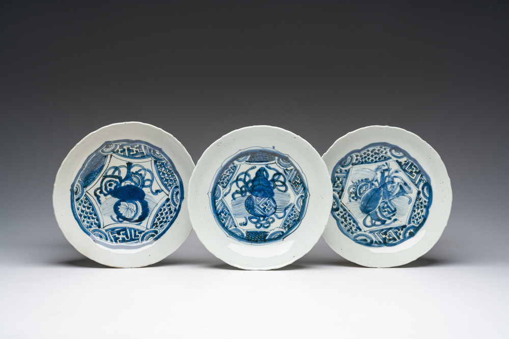 Three Chinese blue and white molded Kraak porcelain plates with double gourd designs, Wanli