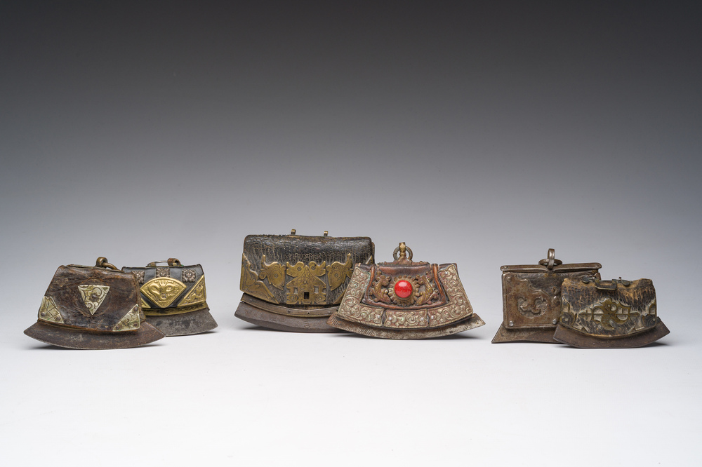 Six Tibetan leather and bronze fire flint purses or chuk muk, 19th C.