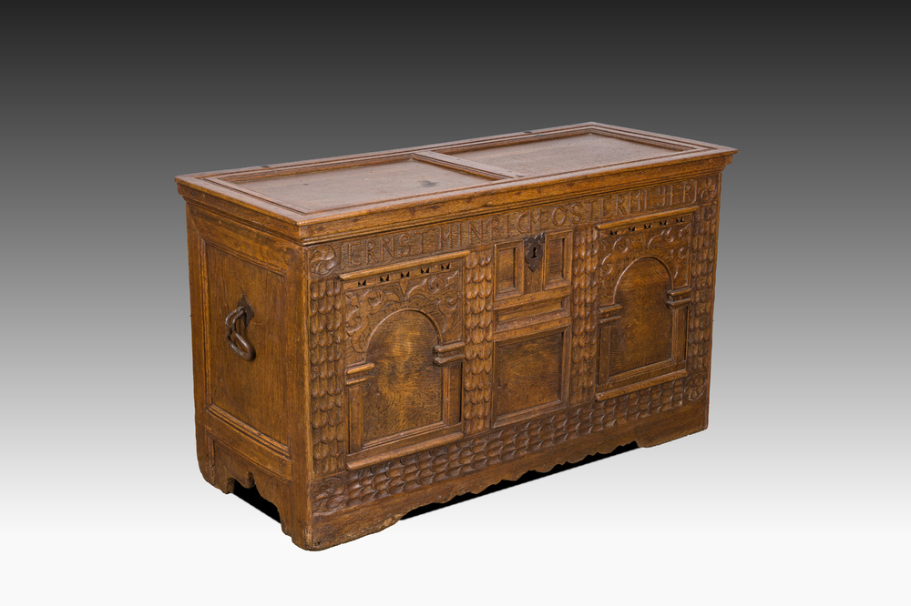 An inscribed German oak chest with two arches, 18th C.