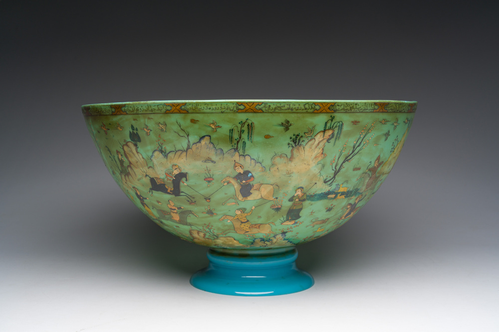 A large turquoise glass bowl painted with battle, hunting and polo scenes, Qajar, Iran, 19th C.